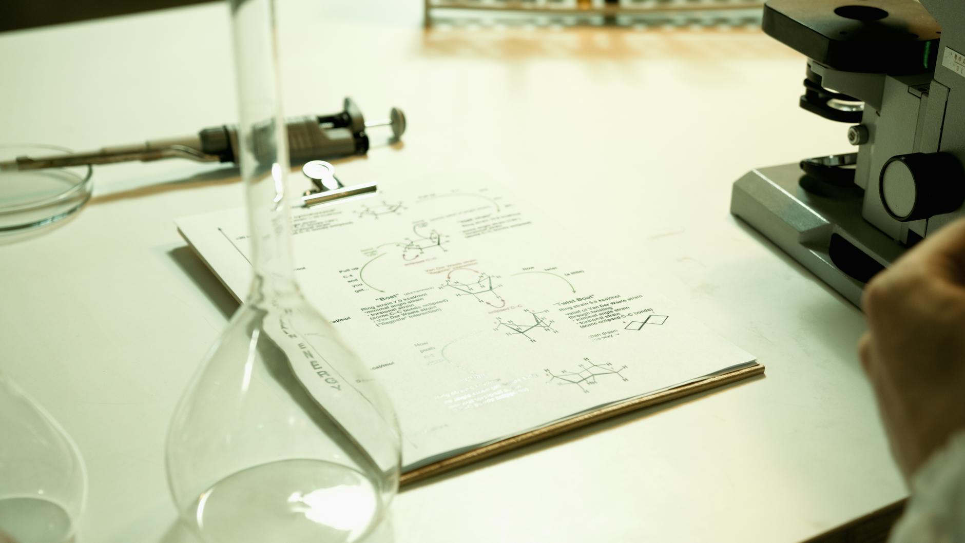 Laboratory desk with microscope and notes, illustrating evidence-based thyroid research