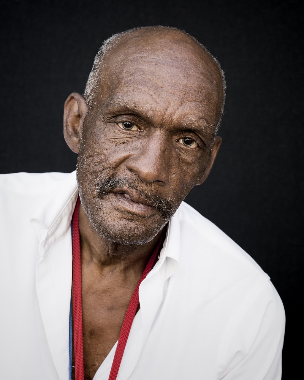 Portrait of an older man outdoors, illustrating healthy ageing and longevity.